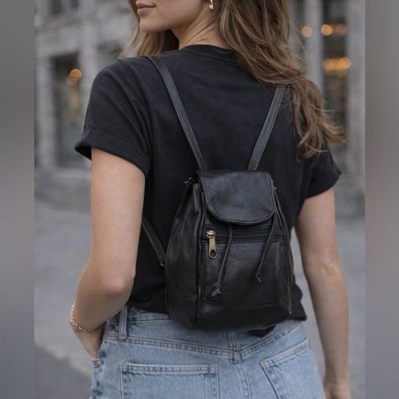 drawstring closure leather backpack Piel Top Flap and innovation The Drawstring